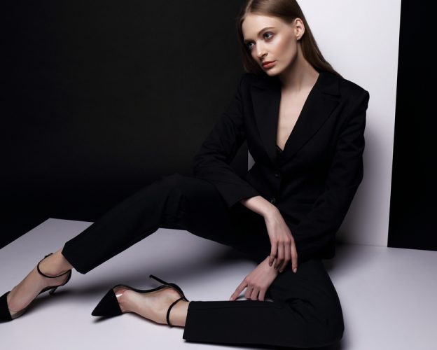 High,Fashion,Portrait,Of,Young,Elegant,Woman,In,Black,Suit.